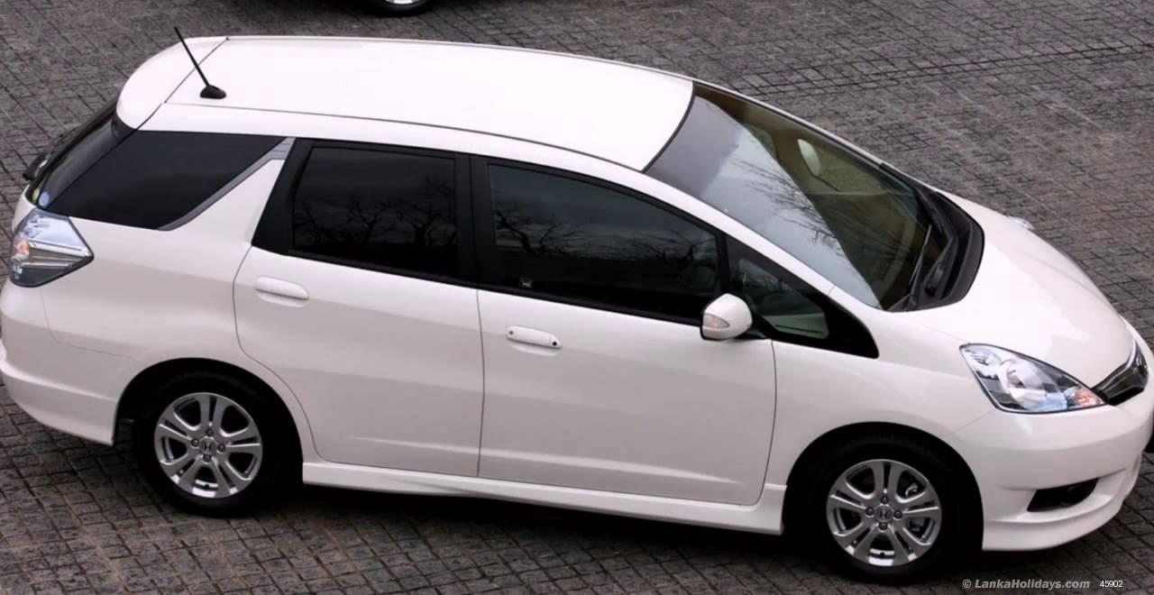 Fit shuttle. Хонда фит шаттл. Honda Fit Shuttle 2014. Honda Fit Shuttle Hybrid 2014. Хонда фит шаттл 2014.